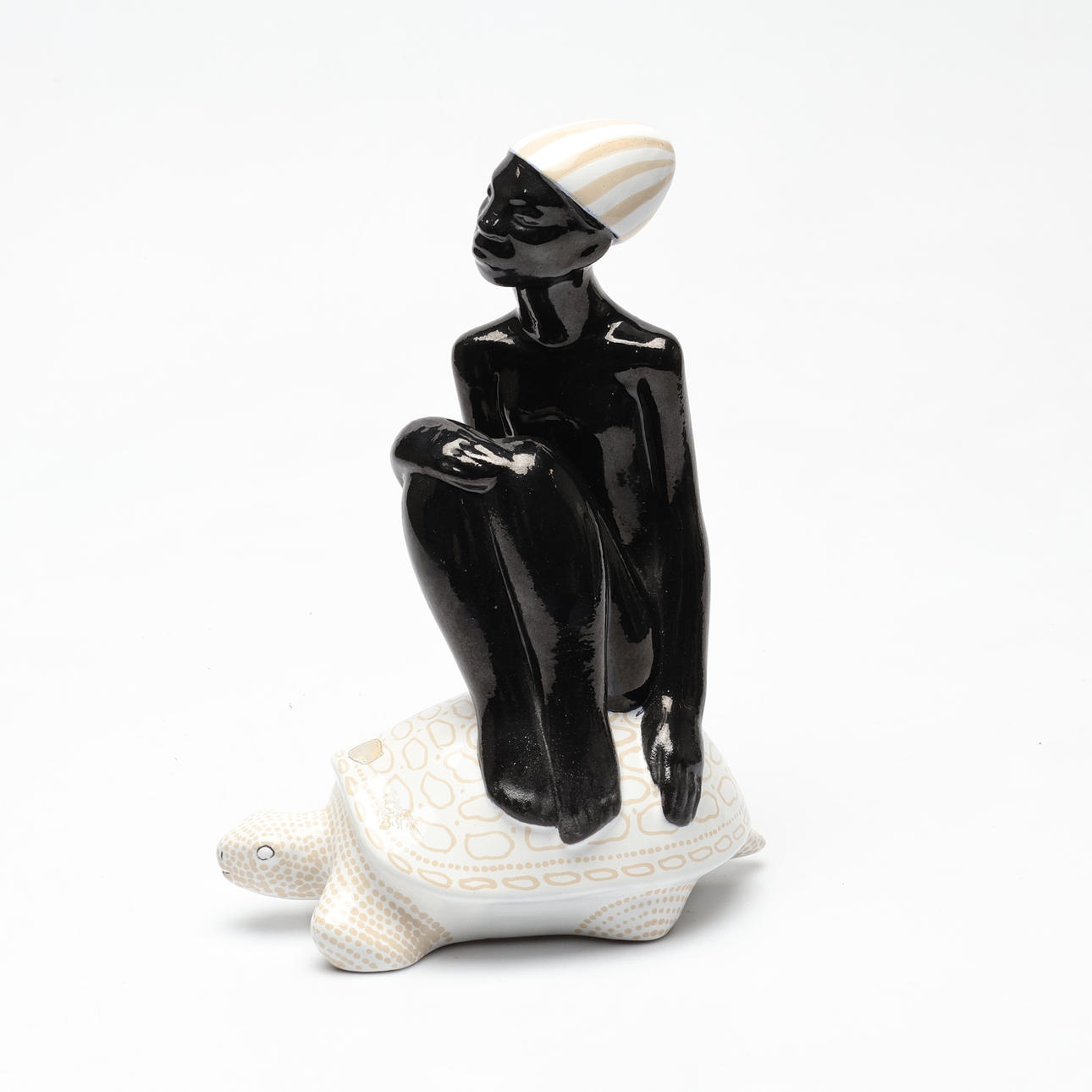 MARI SIMMULSON. Glazed ceramic, boy on turtle, Upsala Ekeby.