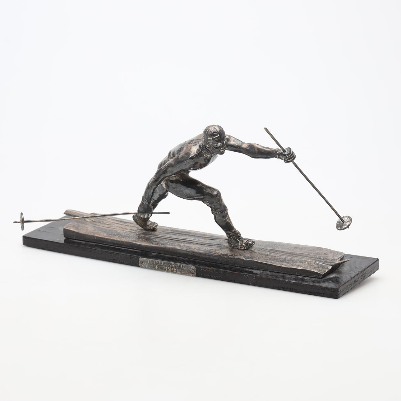 SCULPTURE, skier, nickel silver.