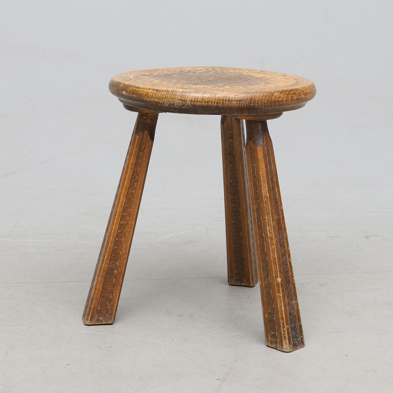 STOOL, carved decoration, signed Esther, dated 1952.
