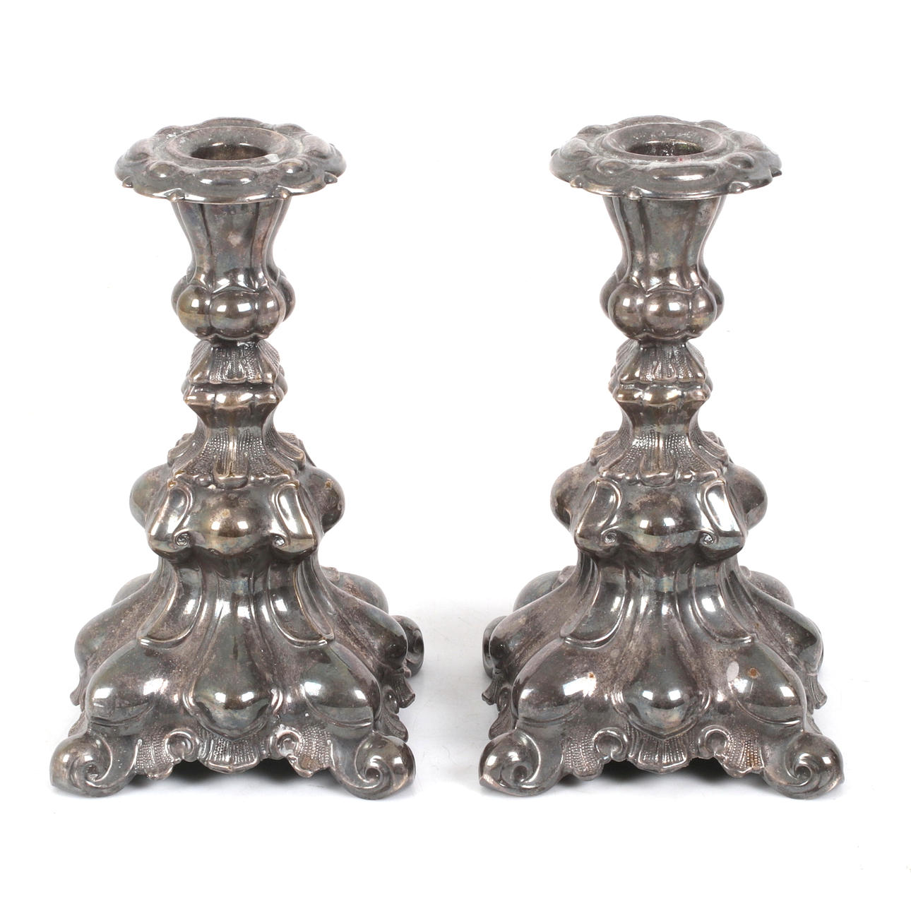 CANDLESTICKS, a pair, nickel silver, Baroque style, 20th century.