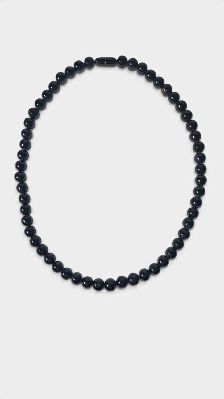 Pärlhalsband.