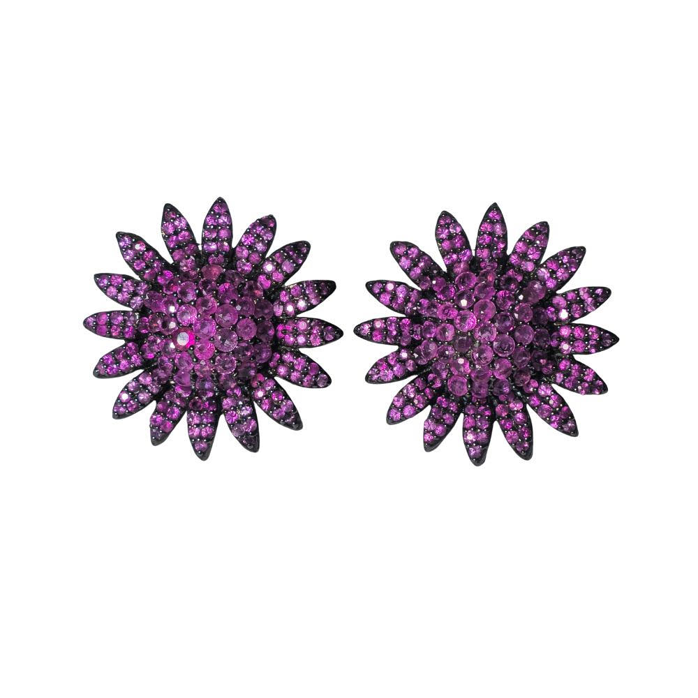 Silver earrings with rhodium plating and sapphires.