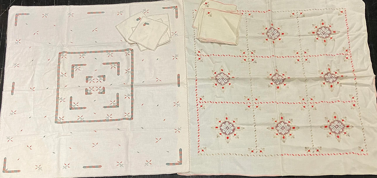 Two embroidered linen tablecloths, 20th Century.