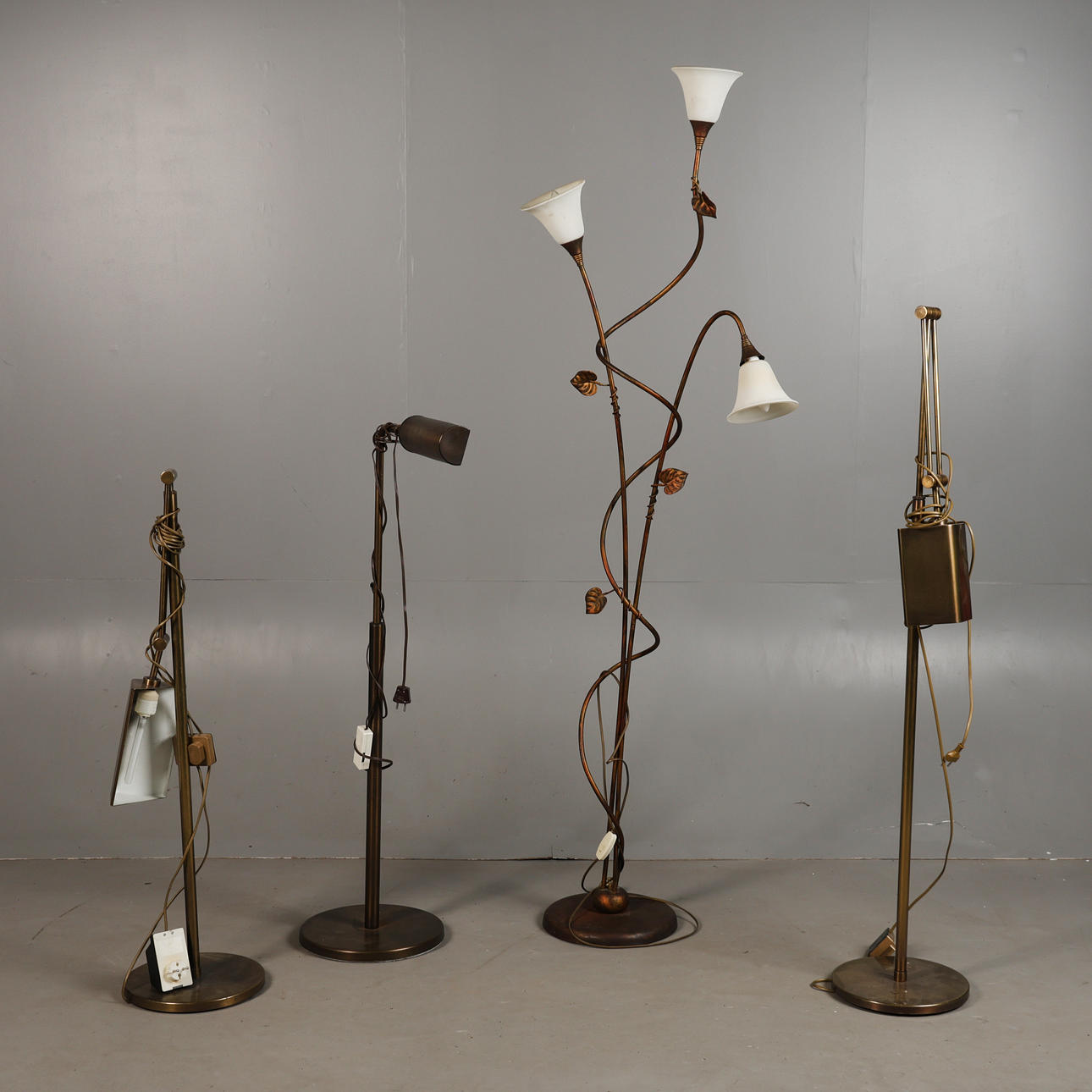 FOUR FLOOR STANDING LAMPS.