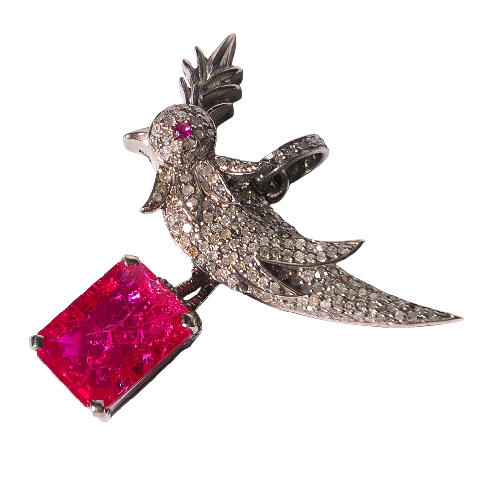 Silver pendant with diamonds and gemstones.