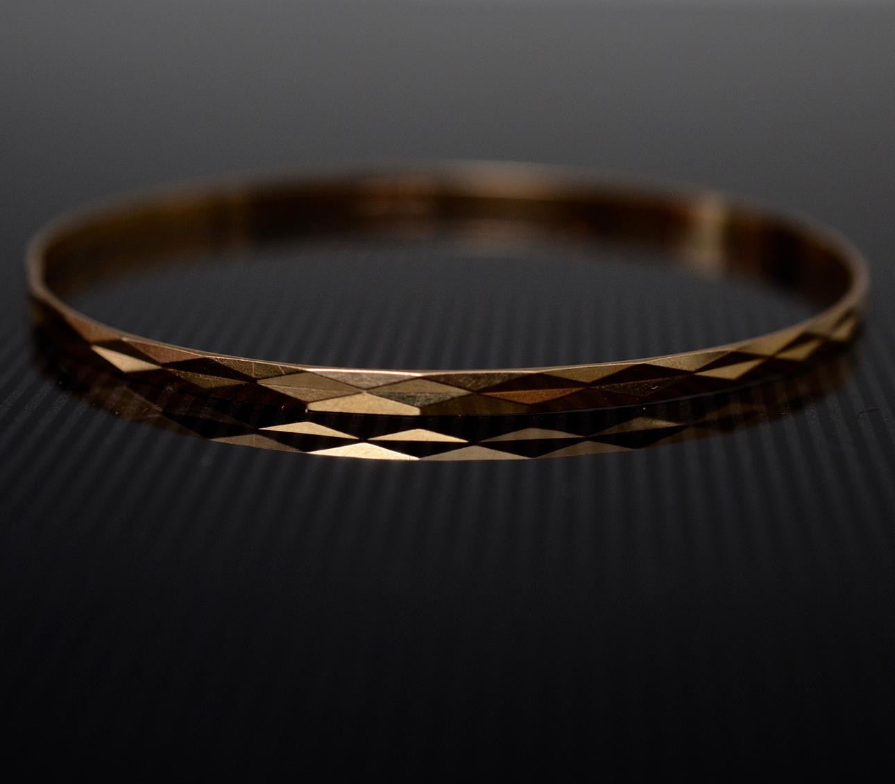 ARMRING 18 KARAT GULD.