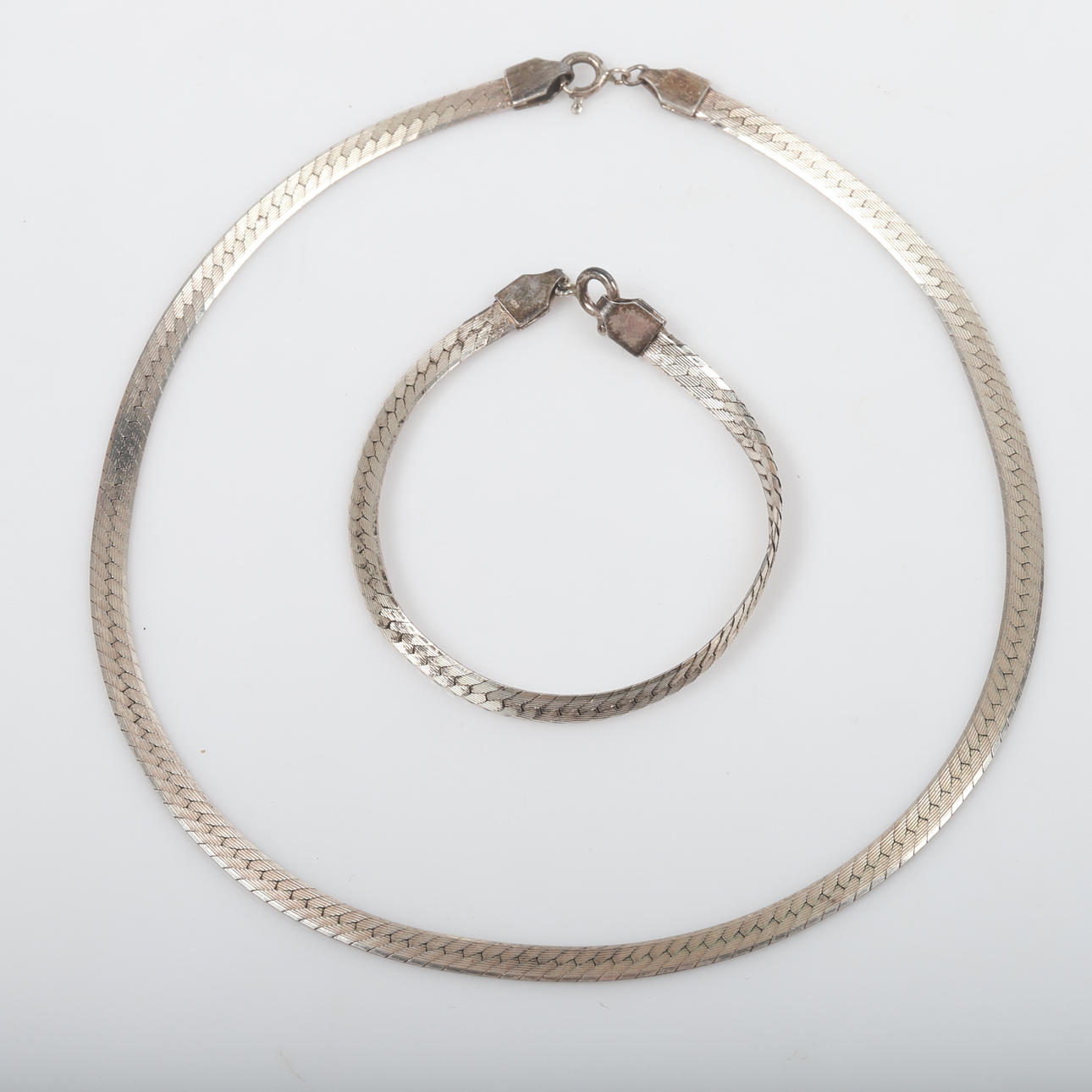 COLLIER SAMT ARMBAND, halvstel länk, sterlingsilver.