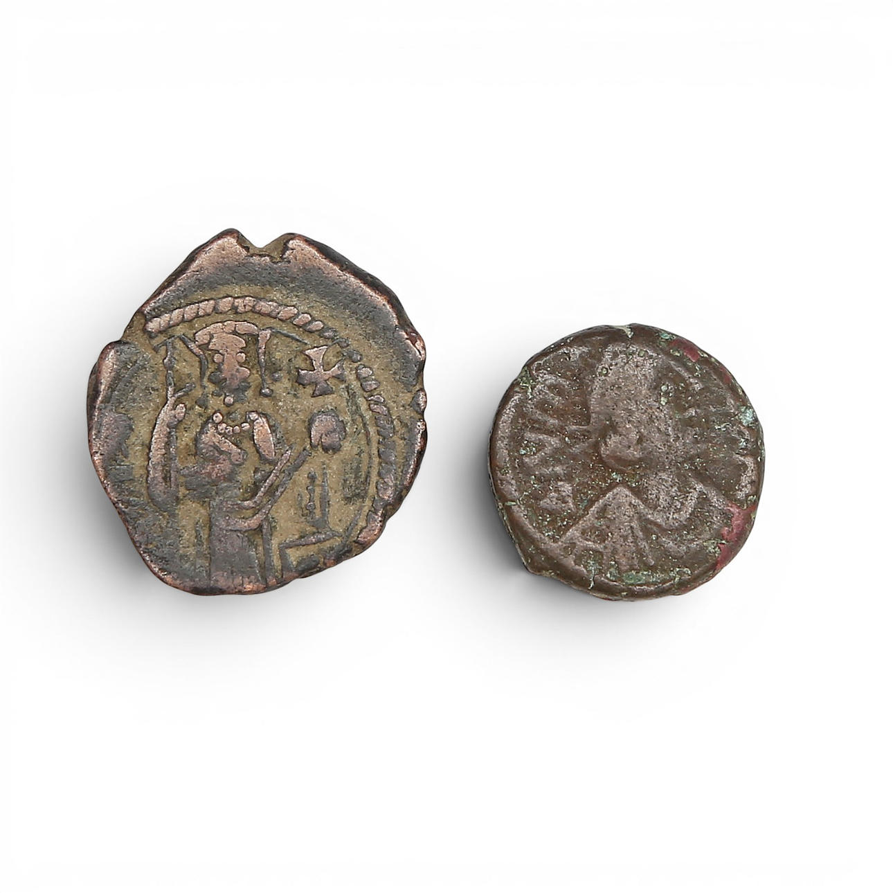 Two Byzantine bronze coins, 6th Century.