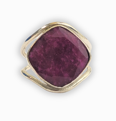 Silver and ruby ring.