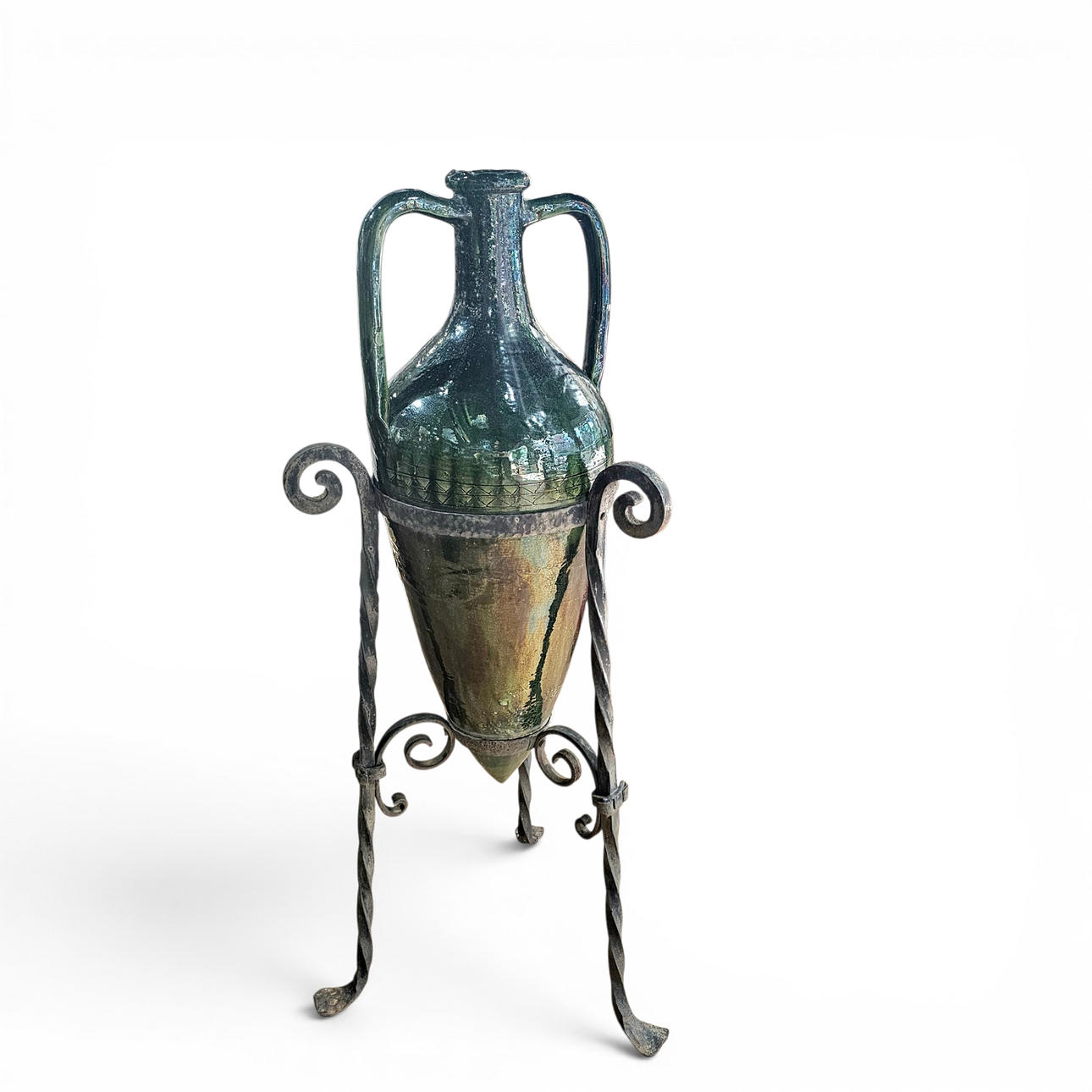 Ceramic amphora with wrought iron stand.
