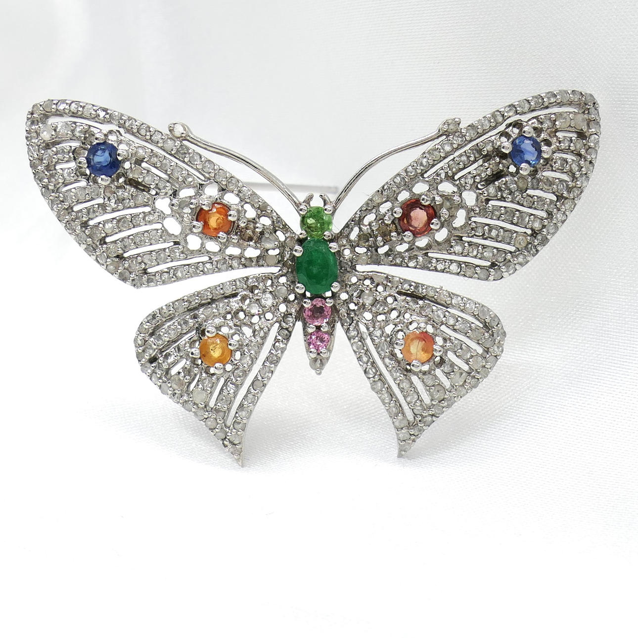 BUTTERFLY BROOCH with emerald, sapphires & diamonds.