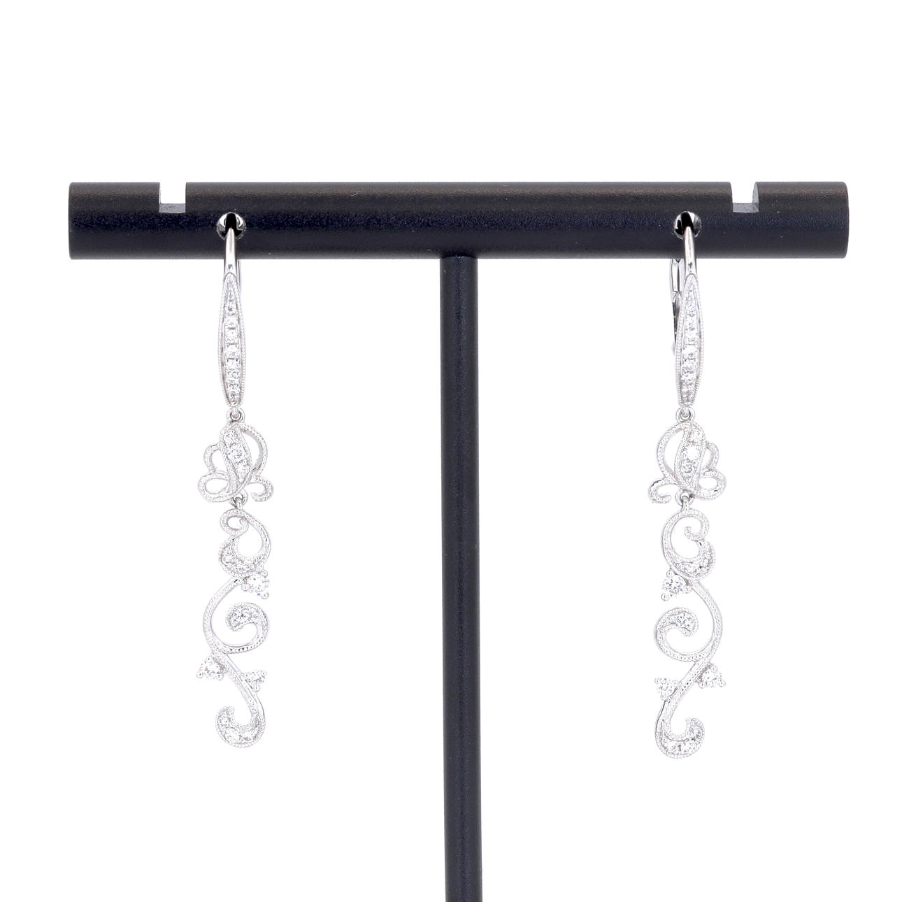 18CT GOLD DIAMOND EARRINGS.