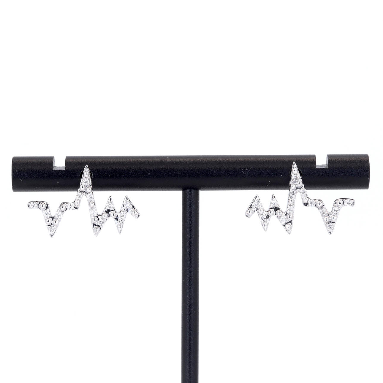 14CT GOLD DIAMOND EARRINGS.