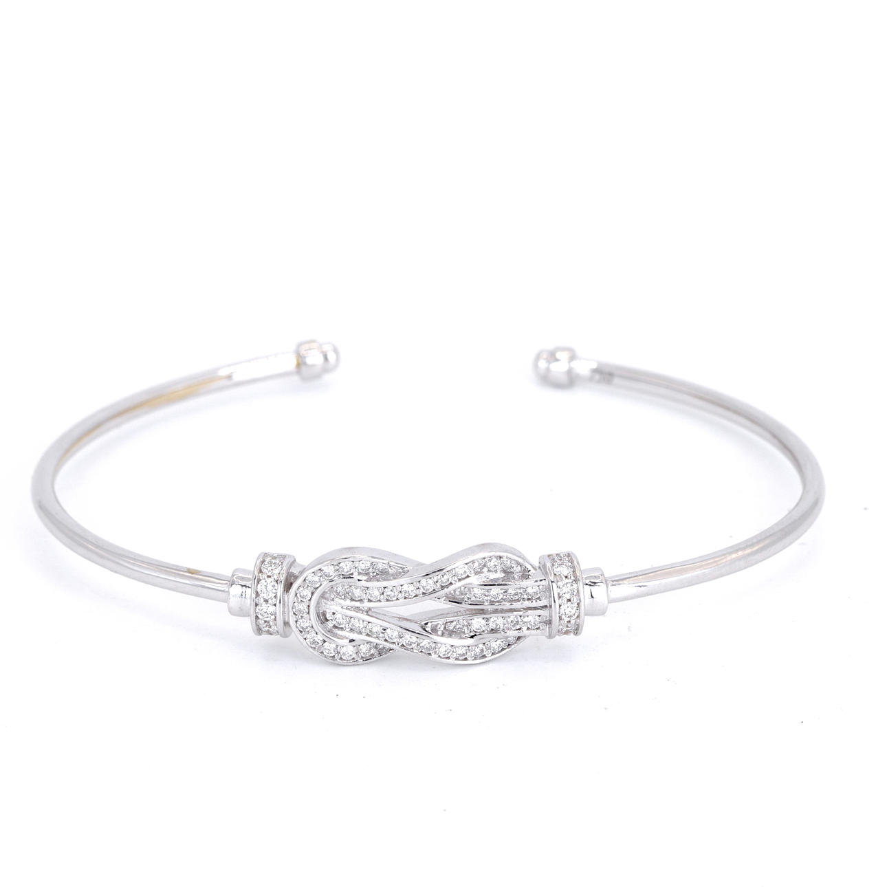 18CT GOLD DIAMOND SET BANGLE.