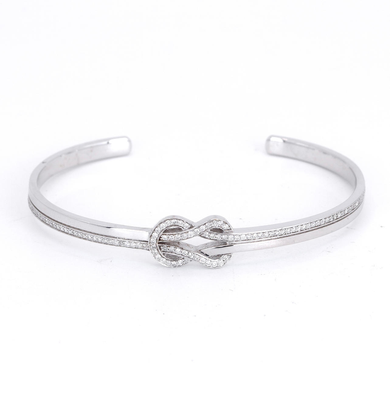 18CT WHITE GOLD DIAMOND BANGLE.
