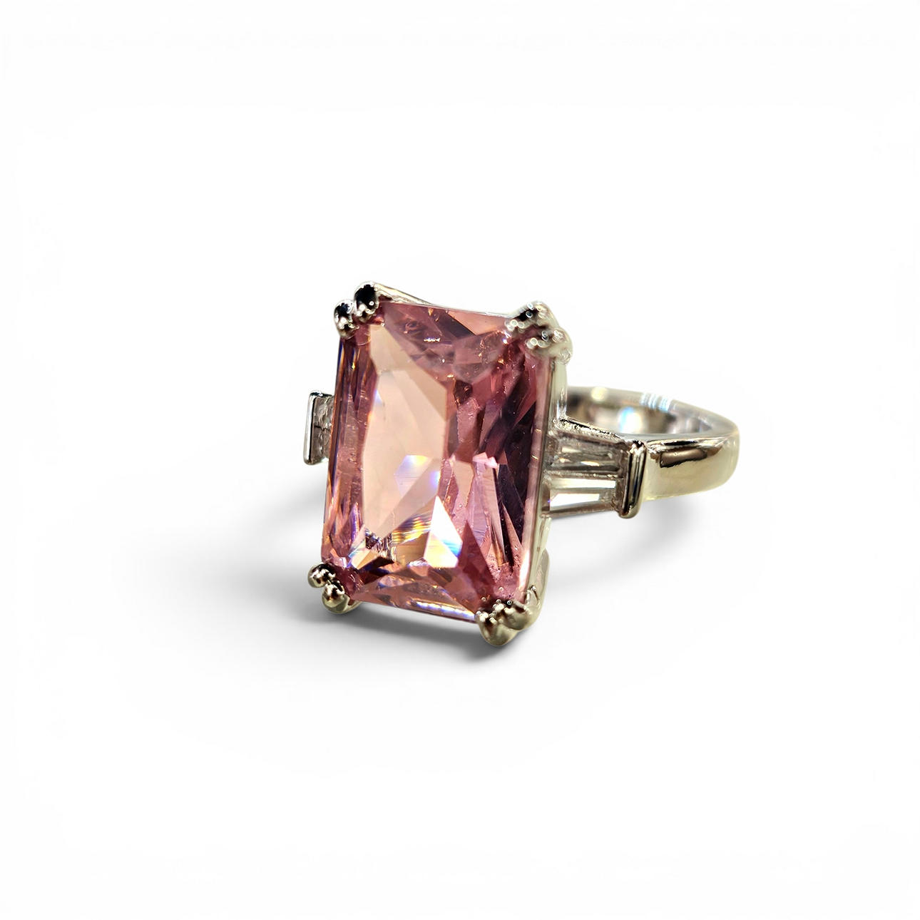 Ring with rose quartz imitation in silver-plated metal.