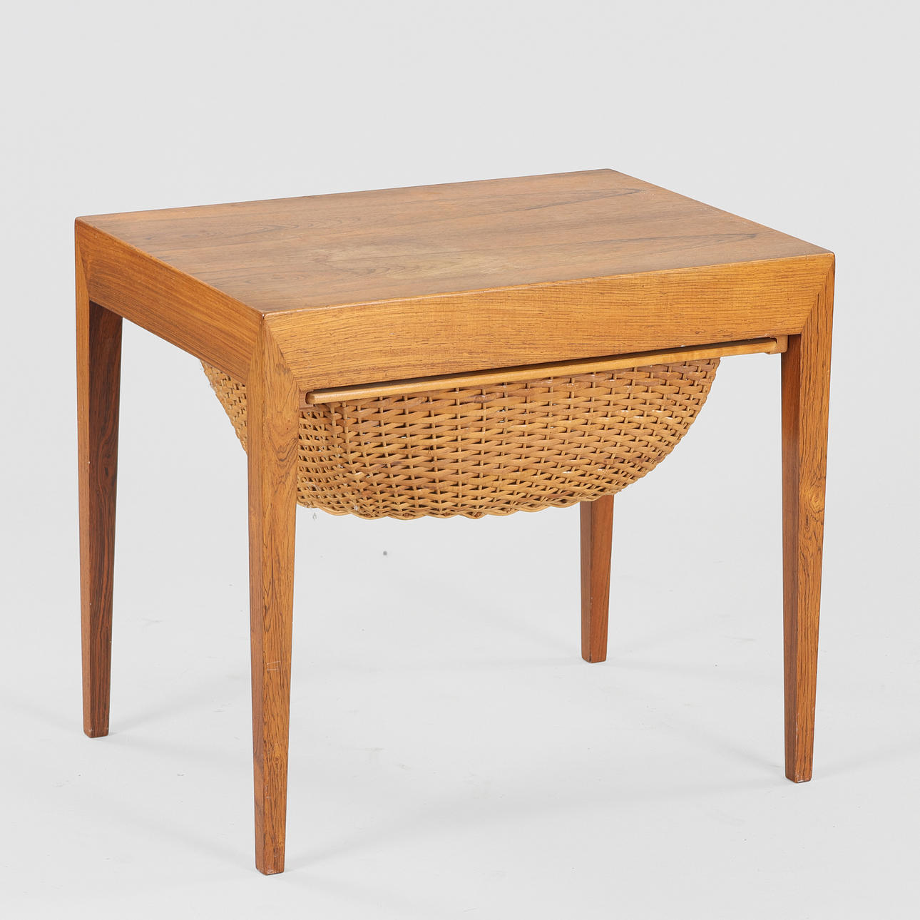 ERIK SEVERIN RISAGER-HANSEN. Rosewood sewing table with woven basket. Haslev Møbelsnedkeri, 1960s.
