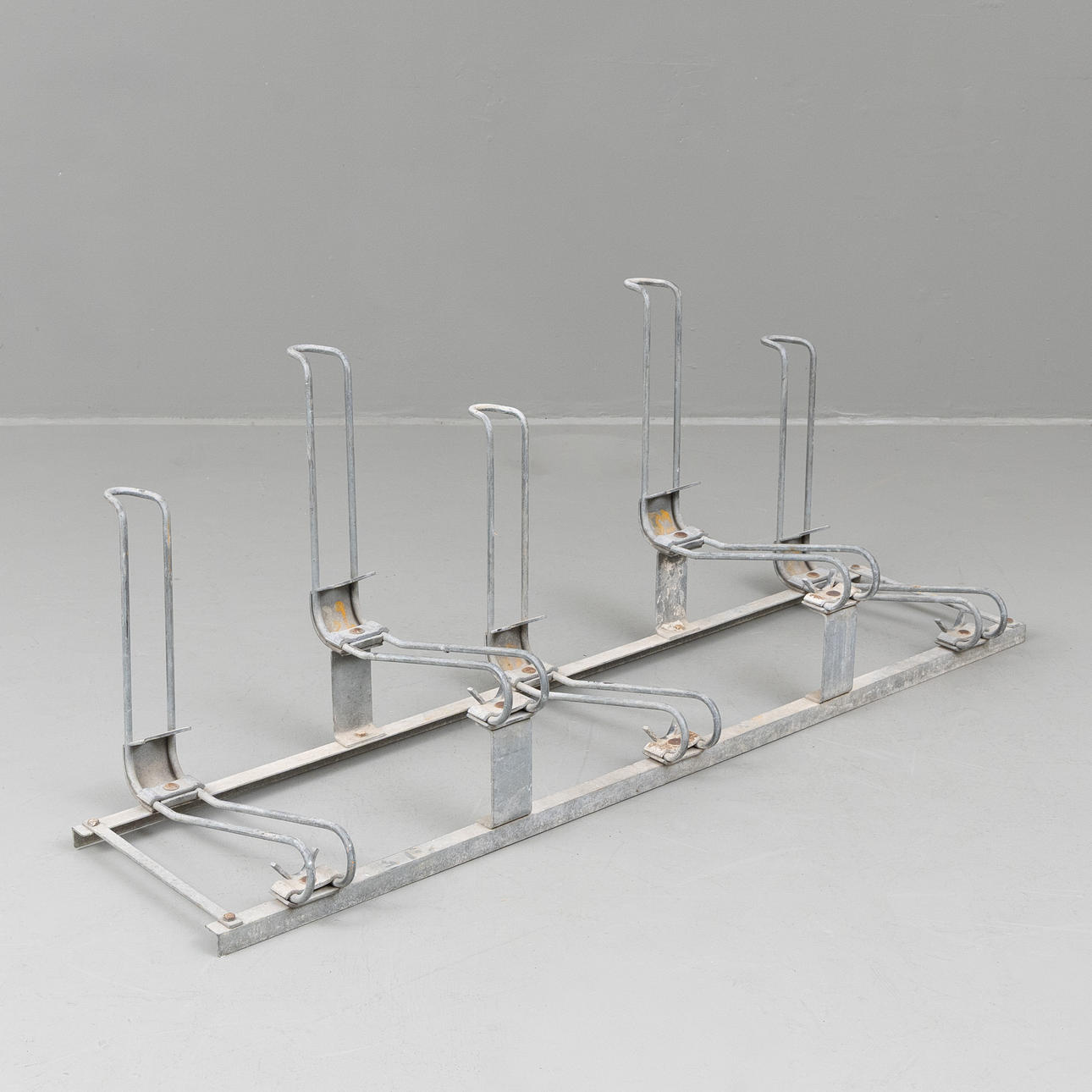 BICYCLE RACK, galvanized, mid-20th century.