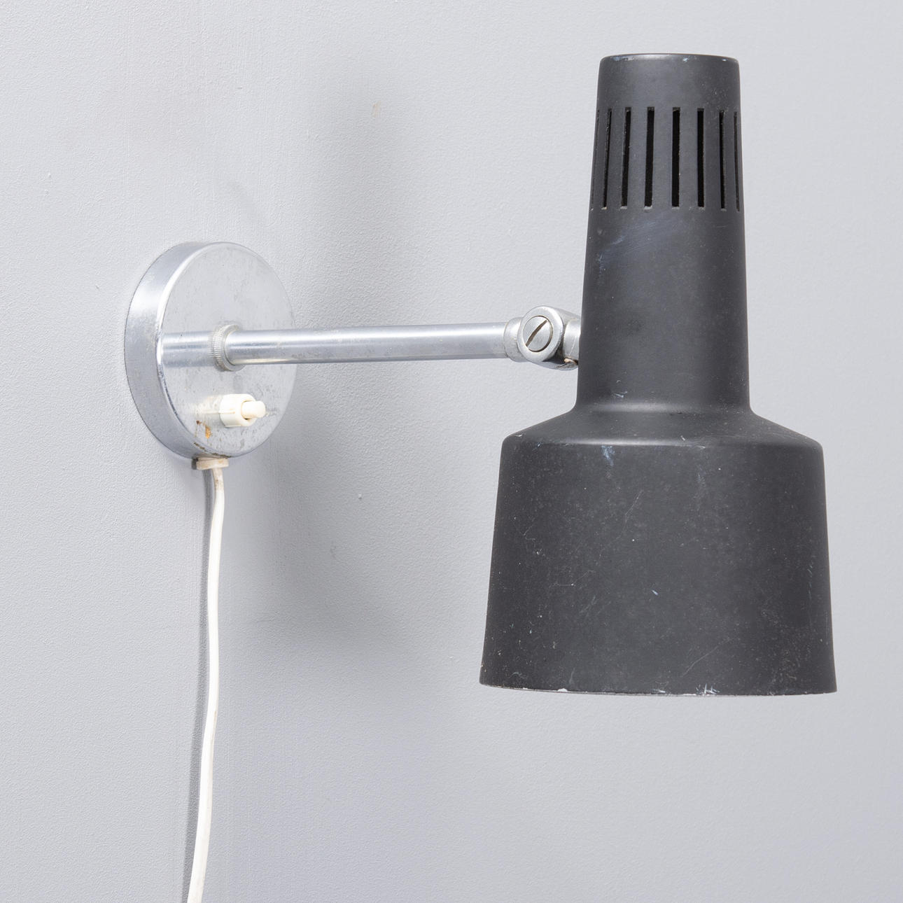 Black-lacquered wall lamp. Denmark, 1960s.