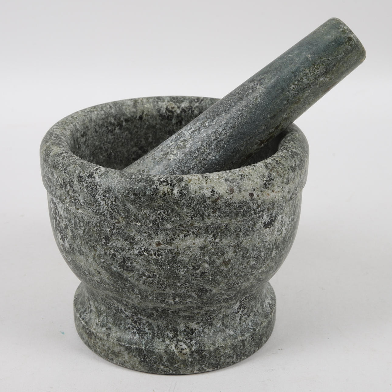 MORTAR WITH PESTLE, stone, 20th century.