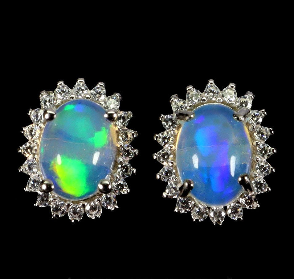 OPAL SILVER CLUSTER EARRINGS.
