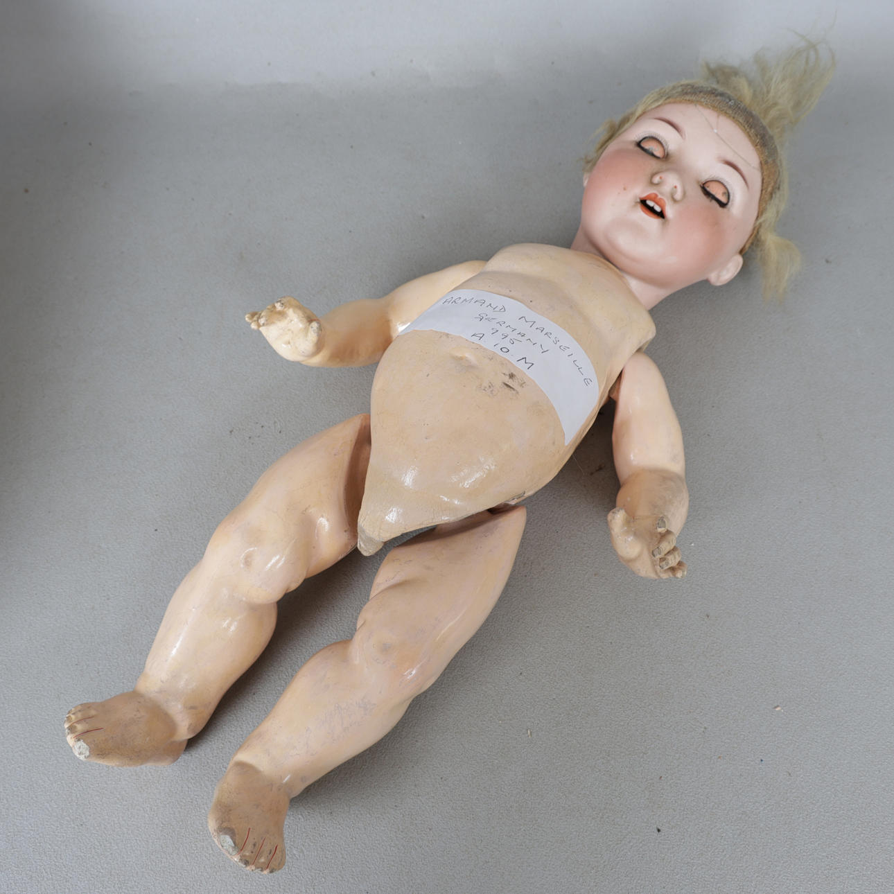 ARMAND MARSEILLE, A BISQUE HEADED DOLL.