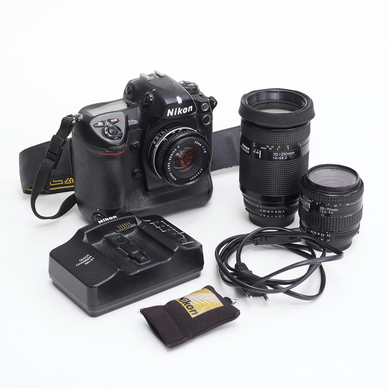 SLR CAMERA, Nikon D2HS with three lenses.