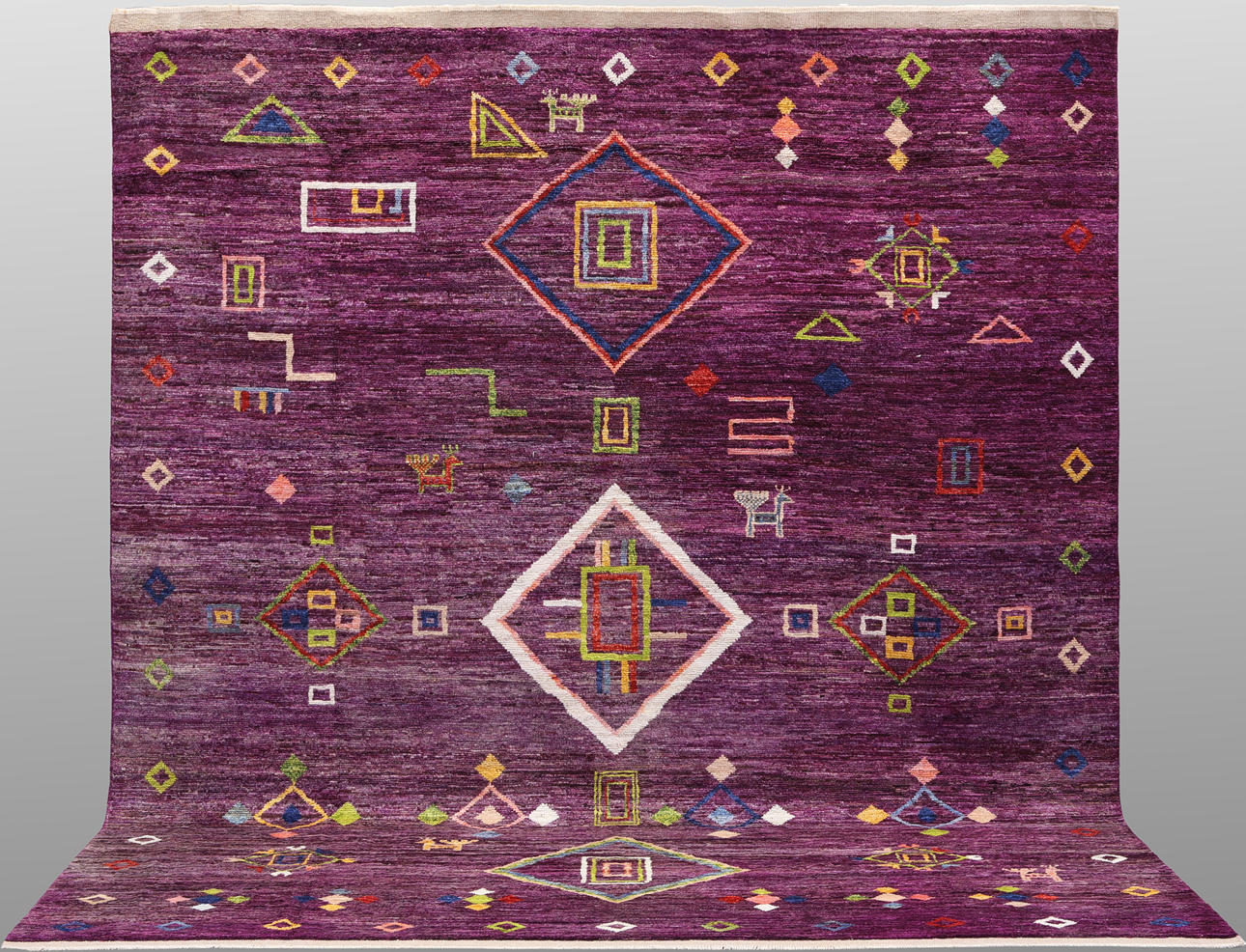 CARPET. Figural Morocco design, 295 x 256 cm.