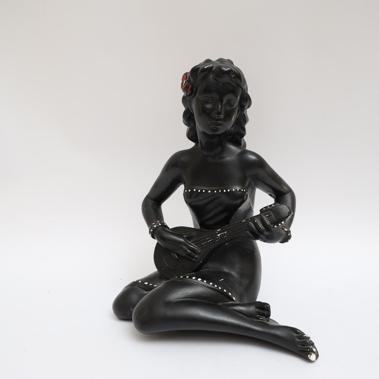 SCULPTURE, playing woman, plaster.