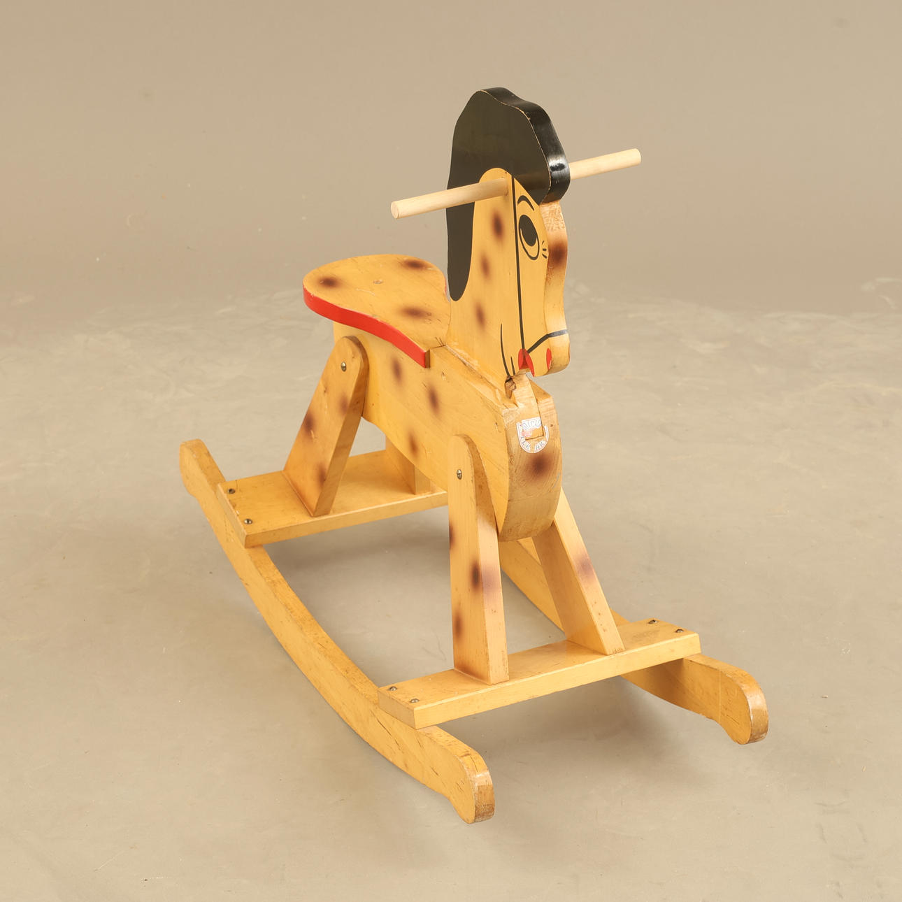 ROCKING HORSE, mid-20th century.