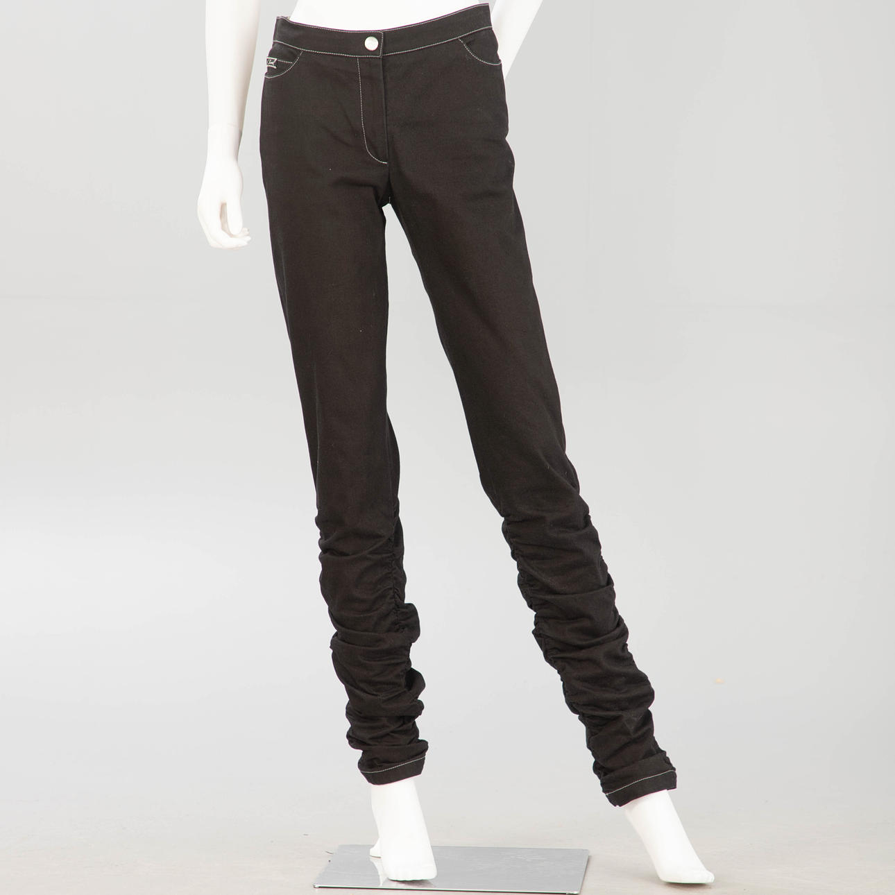 CHANEL. Trousers in black.