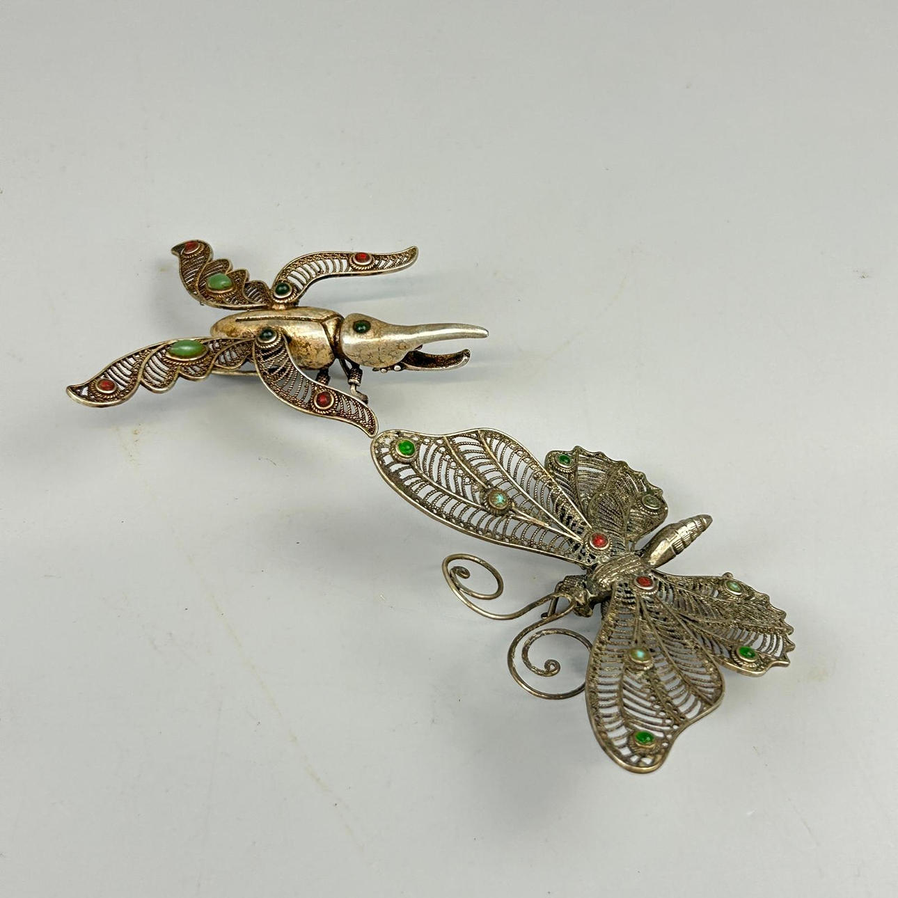 TWO FILIGREE INSECTS.