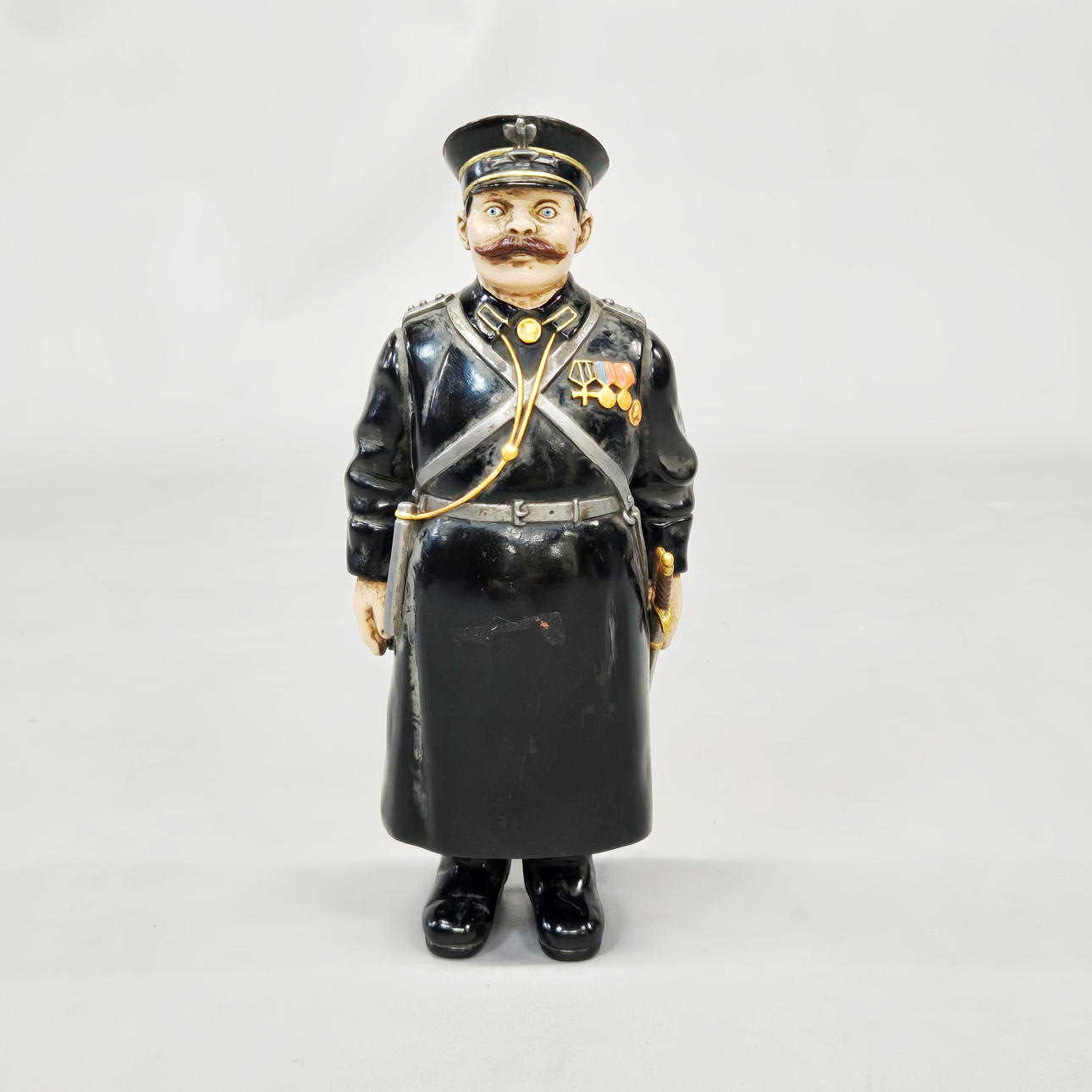 PAINTED BRONZE RUSSIAN POLICEMAN.