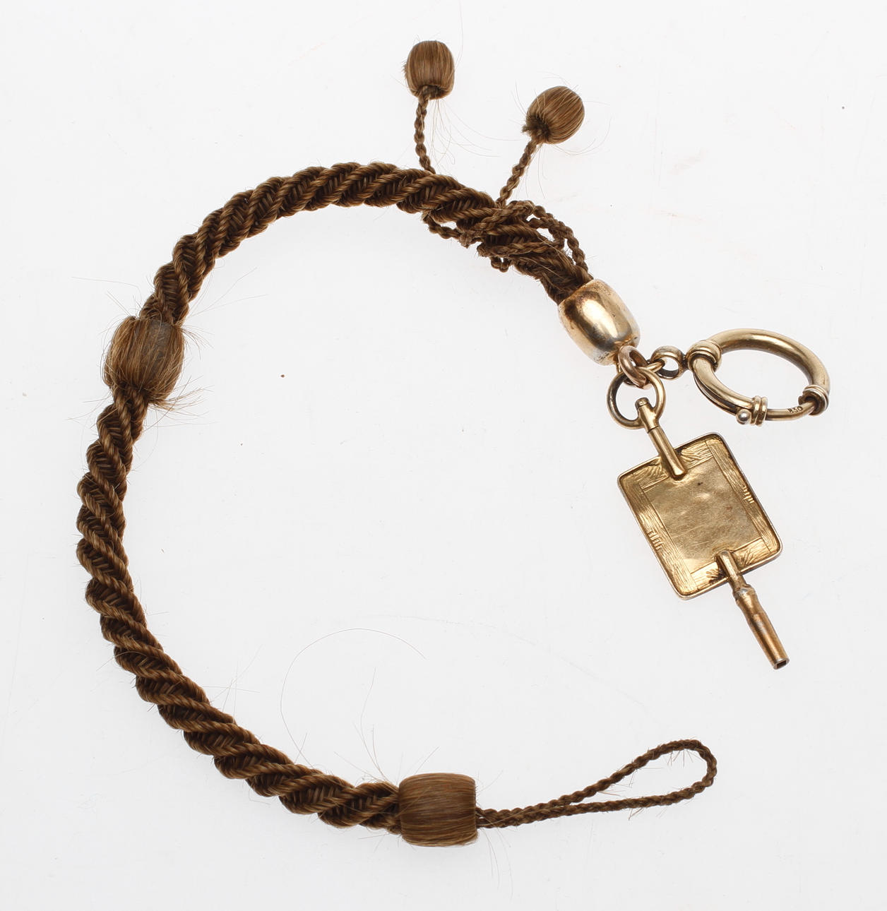 KLOCKKEDJA, silver, hår samt nyckeldragare, 1800-tal.