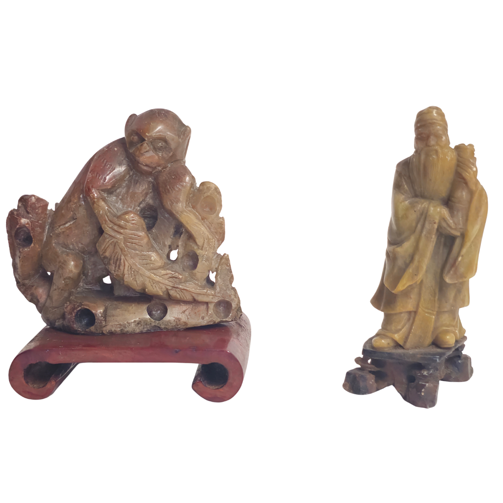 Soapstone monk and hand.