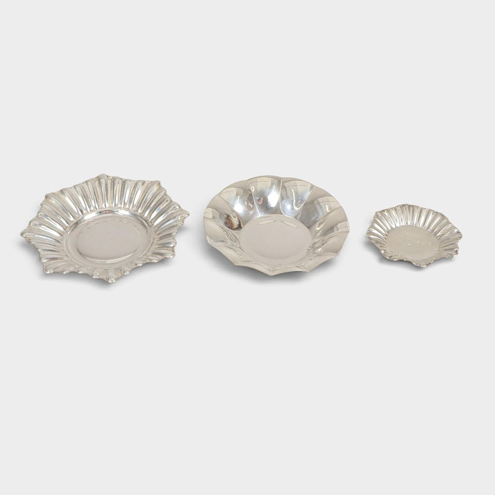 Tre brickor i spanskt stämplat silver.