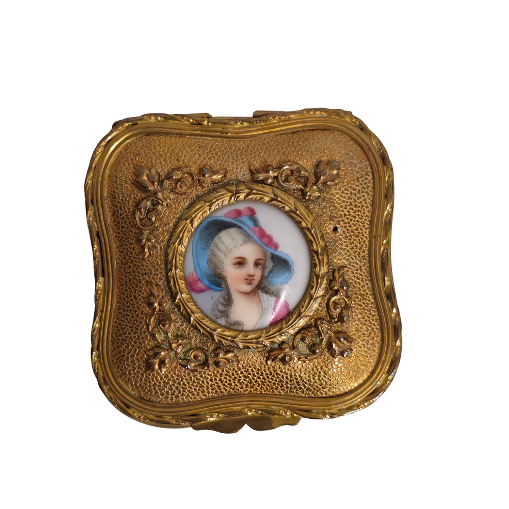 Gilt box with porcelain miniature.