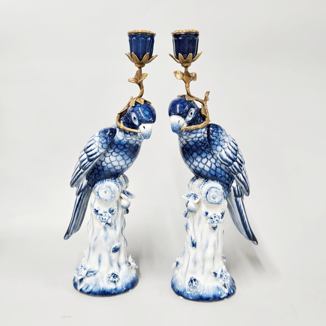 PORCELAIN ORMOLU CANDLESTICKS.