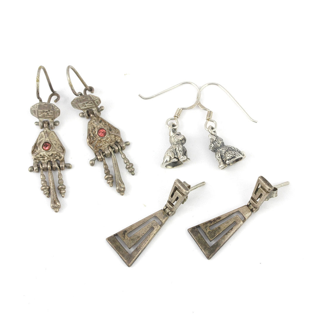 THREE PAIRS OF SILVER EARRINGS.
