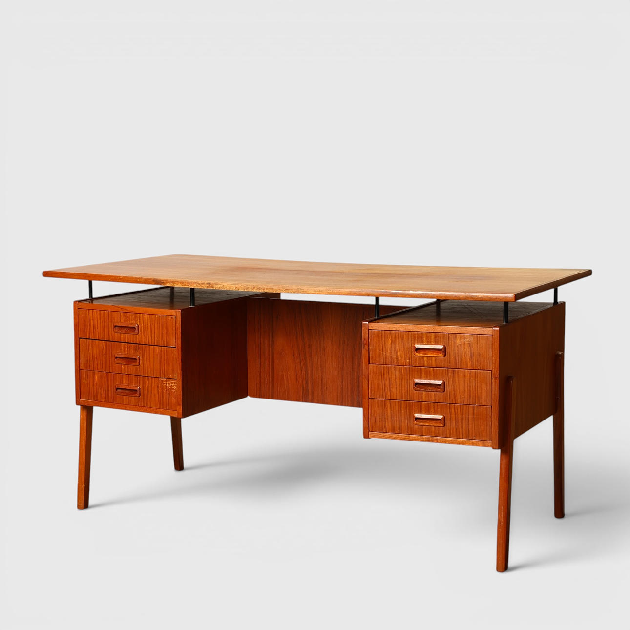 Freestanding teak desk, 1950s-60s.