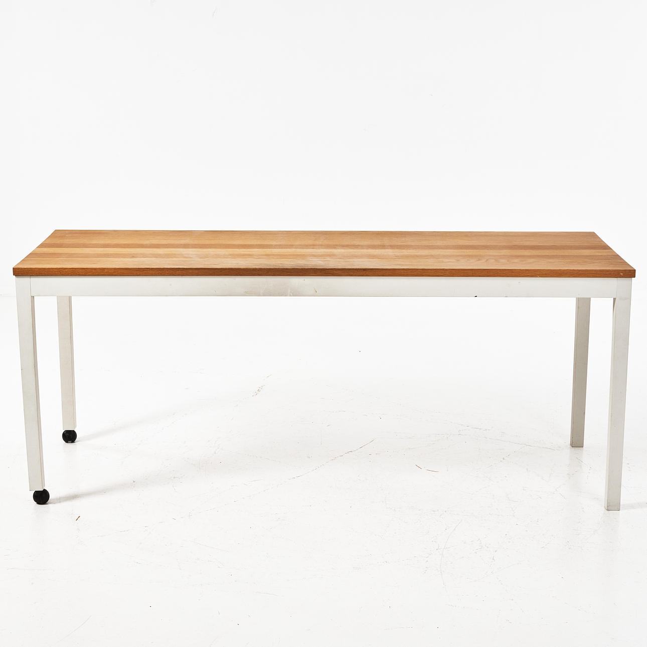 NIRVAN RICHTER. Table, Norrgavel, 1990s/2000s, solid oak top, white-painted birch base, two legs with casters.
