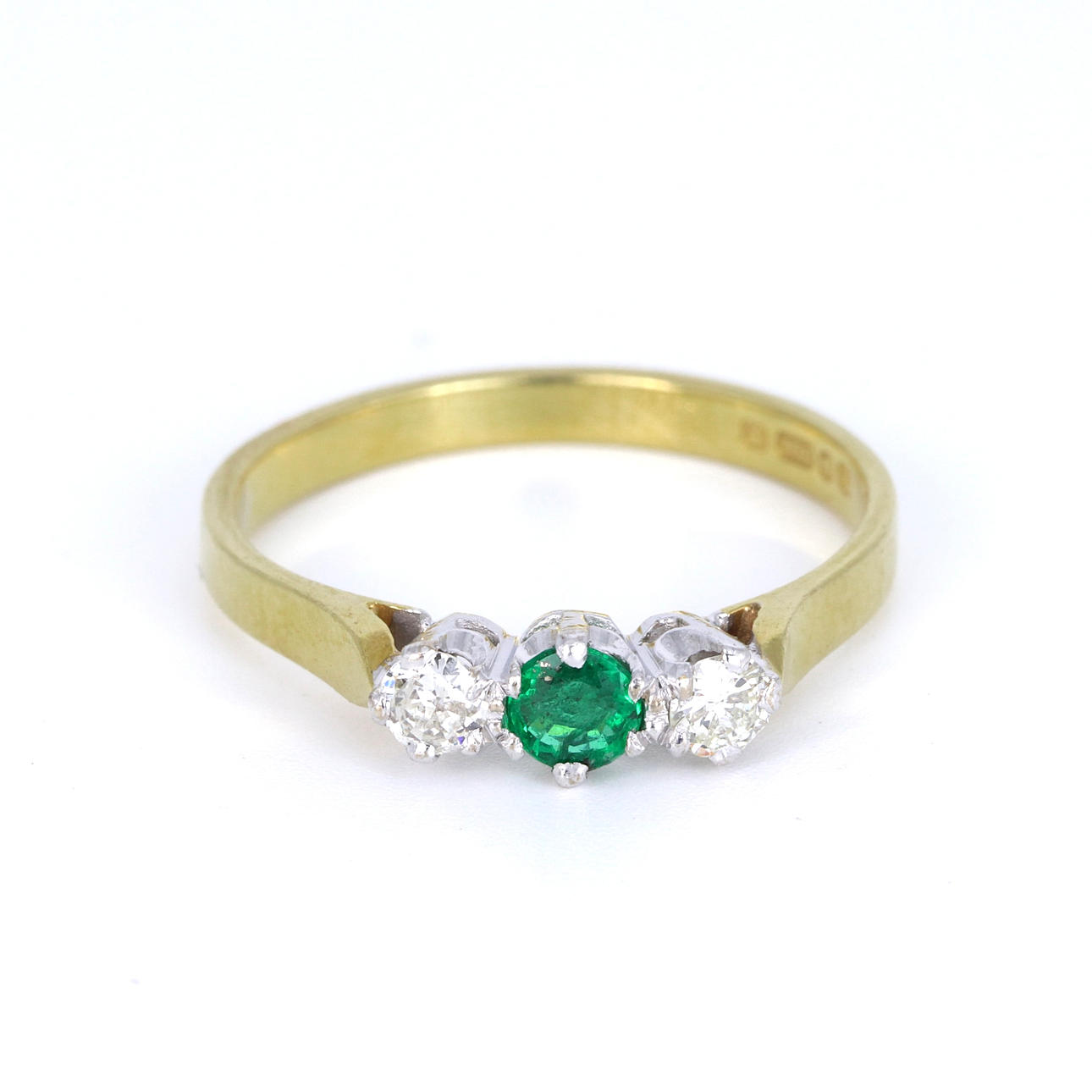18CT EMERALD & DIAMOND RING.