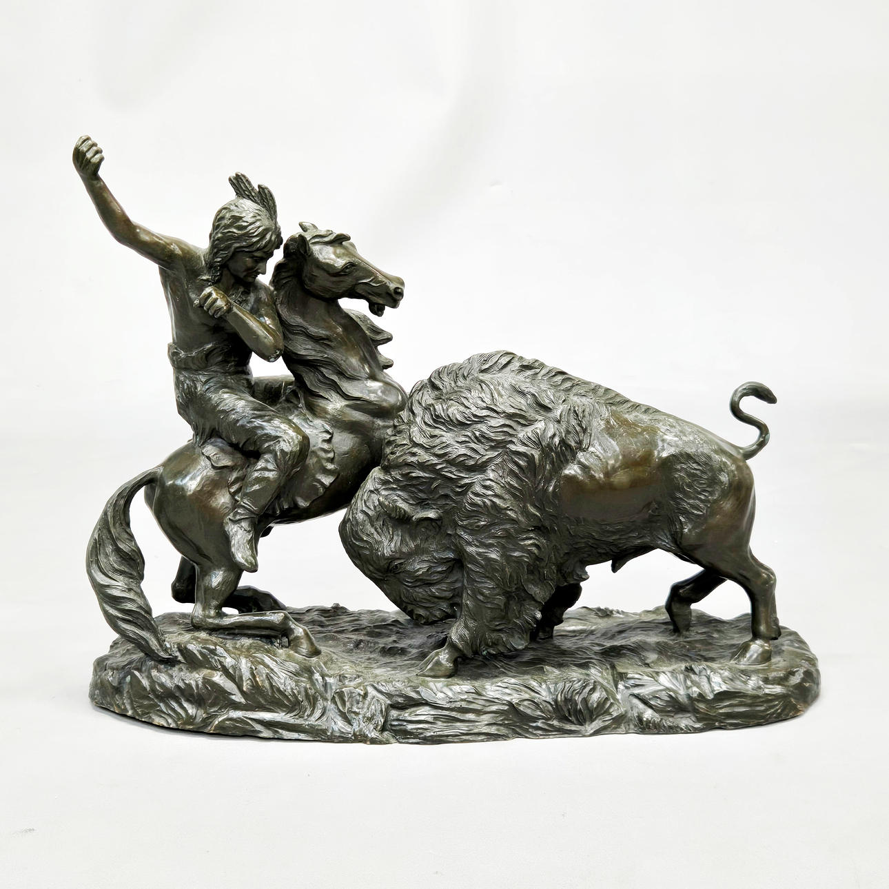 BRONZE NATIVE AMERICAN HUNTING SCENE.