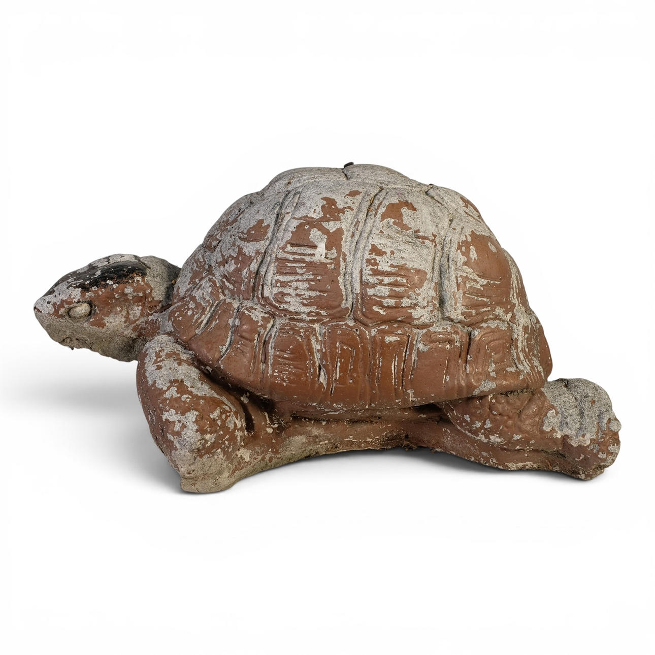 Stone sculpture. Depicting a turtle.