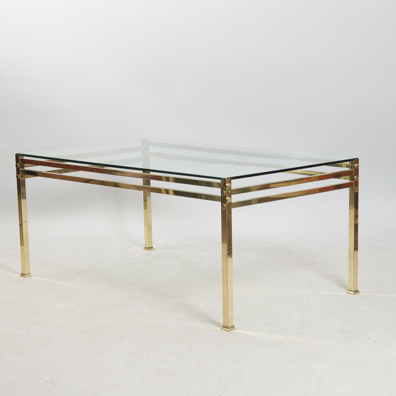 COUCHTISCH, Glas/Messing, 70er Jahre.