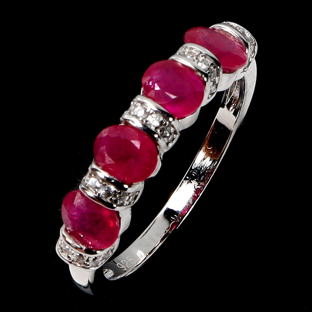 RUBY SILVER HALF ETERNITY RING.