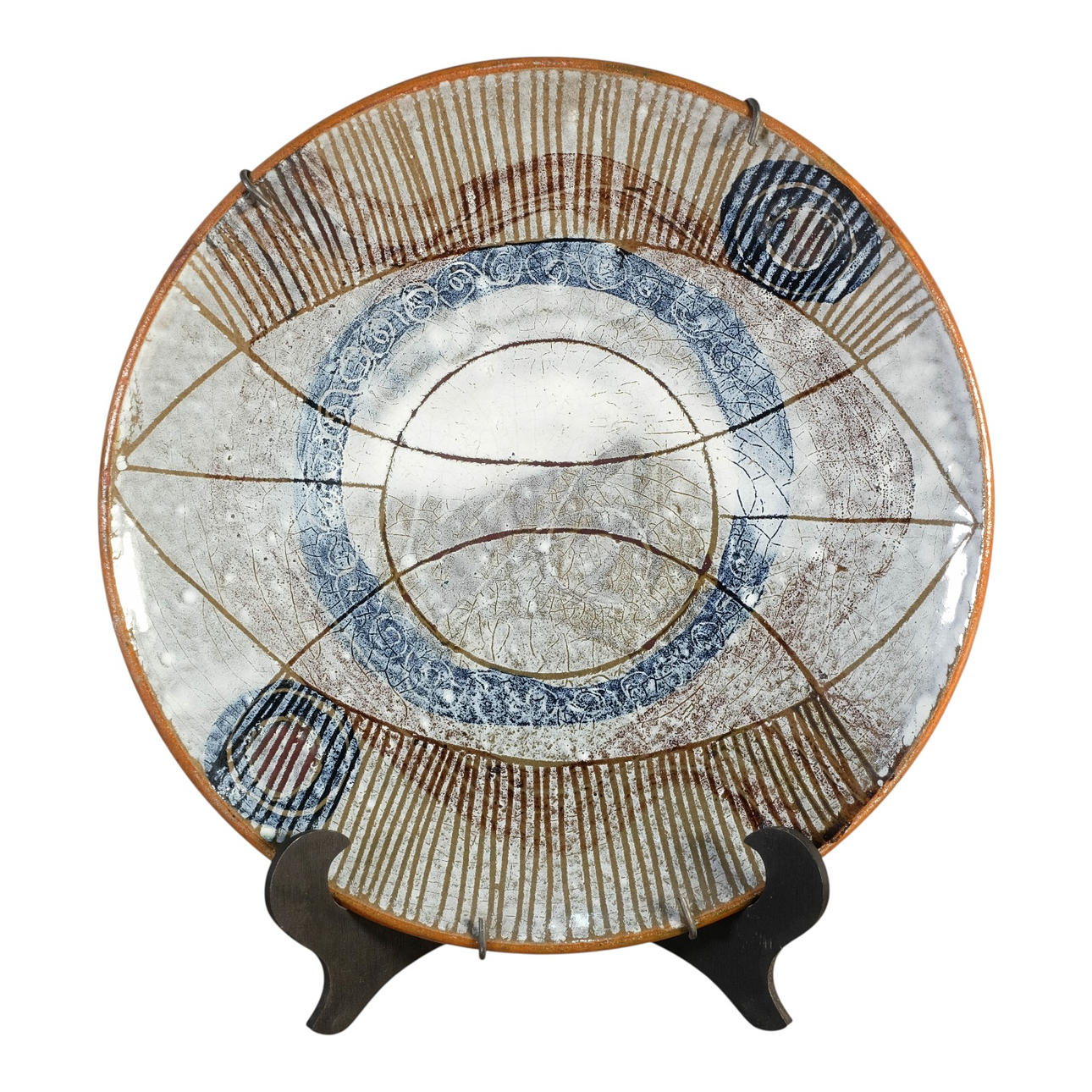 Painted ceramic plate. Geometric motifs.