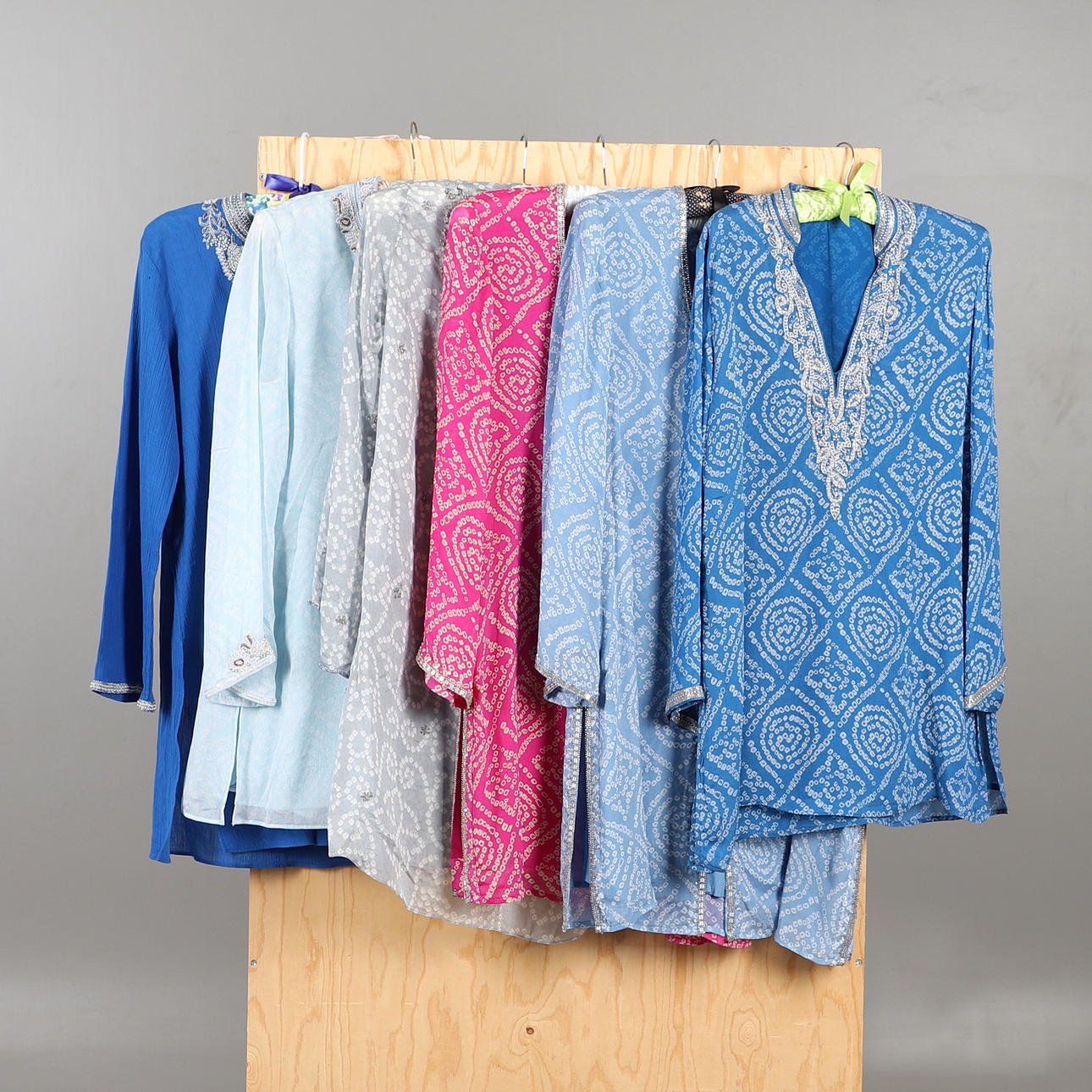 KANESHKA: FIVE TUNIC TOPS.