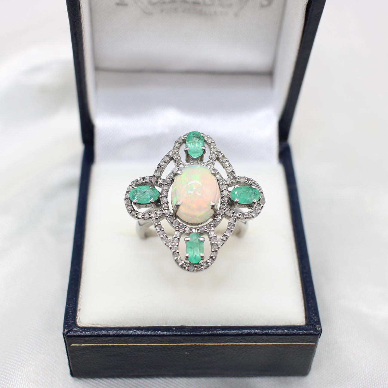 OPAL, EMERALD & DIAMOND RING.