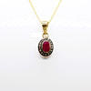 RUBY & DIAMOND PENDANT NECKLACE.